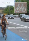 in bicicletta nelle aree urbane cover